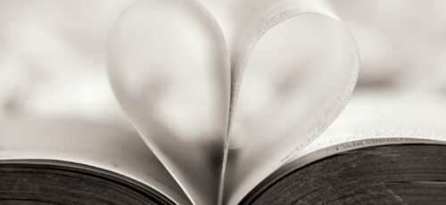 heart shape book page close-up photography
